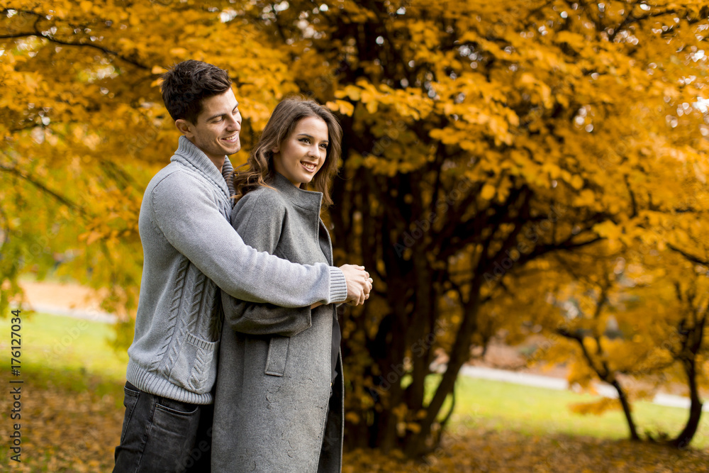 Young couple in love walking together in the park Young couple in love walking together in the park