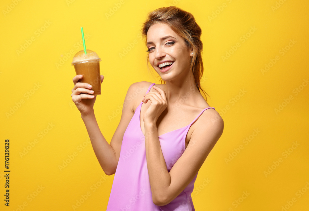 Beautiful young woman with fresh smoothie on color background Beautiful young woman with fresh smoothie on color background