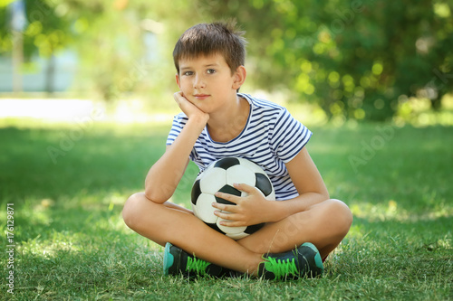 Cute boy with soccer ball s...