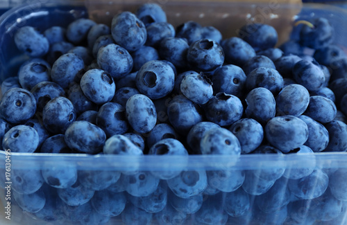 Wallpaper Mural Fresh blueberries in plastic container at market, closeup Torontodigital.ca