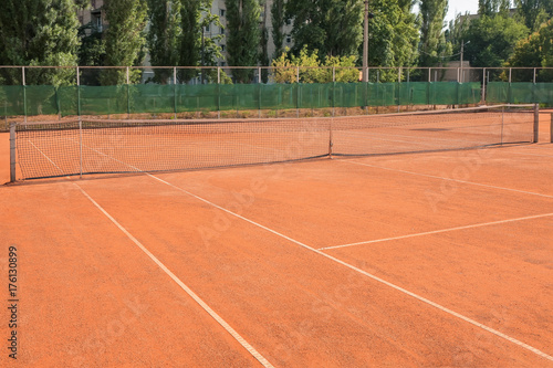 Tennis court on sunny day © Africa Studio