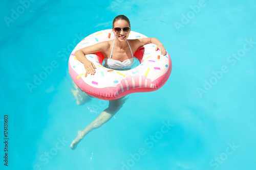 Young woman with inflatable...