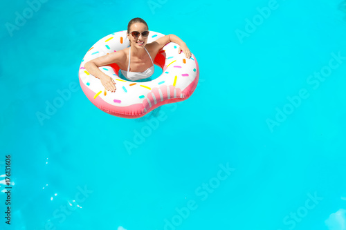 Young woman with inflatable...