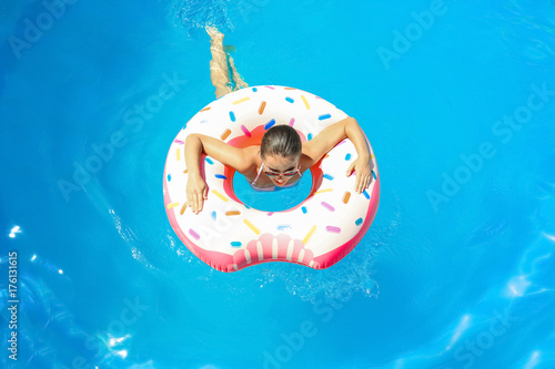 Young woman with inflatable...
