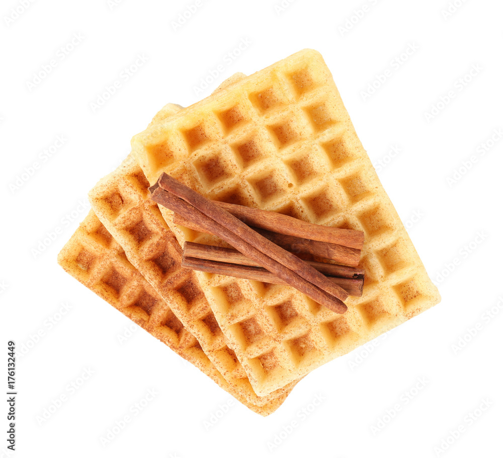 Delicious cinnamon waffles, isolated on white Delicious cinnamon waffles, isolated on white