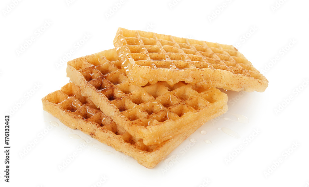 Delicious cinnamon waffles, isolated on white Delicious cinnamon waffles, isolated on white