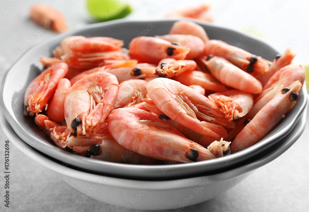 Plate with delicious shrimps on table Plate with delicious shrimps on table