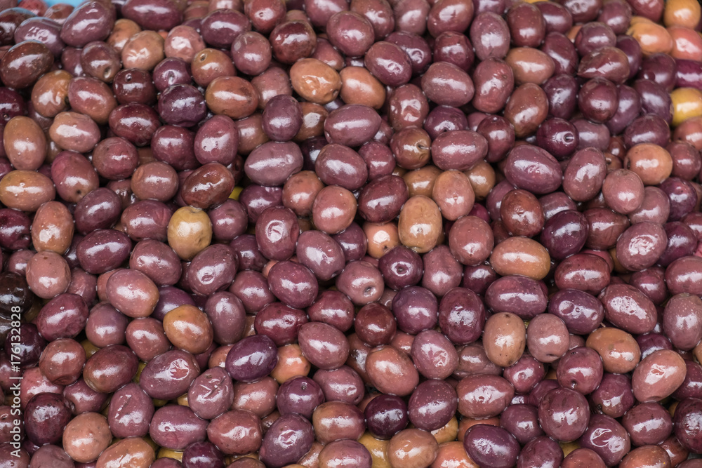 Fresh brown olives closeup