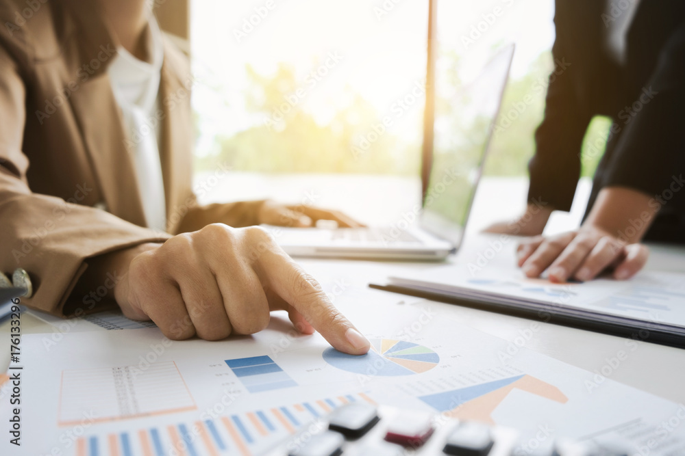 business financier audit working with laptop and data annual report business financier audit working with laptop and data annual report