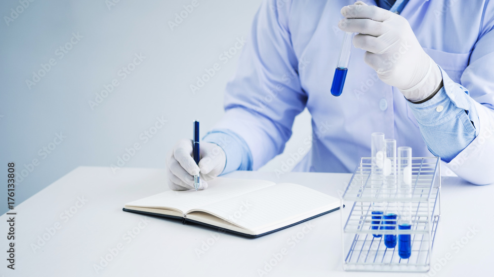 medical chemist / scientist student experiments test tube in laboratory medical chemist / scientist student experiments test tube in laboratory