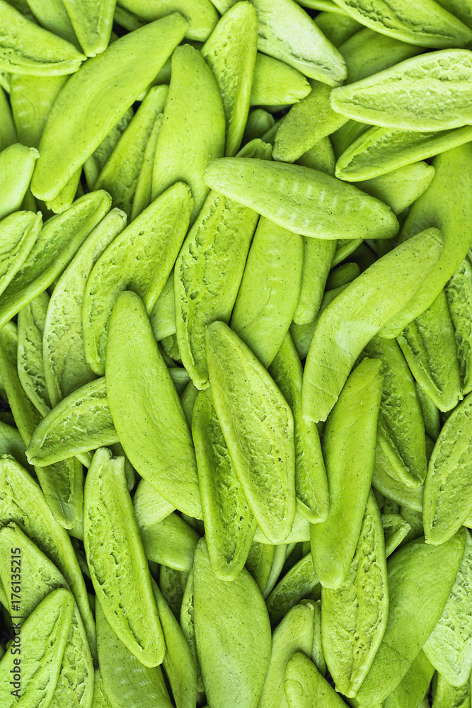 Heap Pile of Uncooked Italian Green Spinach in Olive Tree Leaf Shape. Bright Vibrant Color. Top View. Food Background Pattern. Copy Space Heap Pile of Uncooked Italian Green Spinach in Olive Tree Leaf Shape. Bright Vibrant Color. Top View. Food Background Pattern. Copy Space