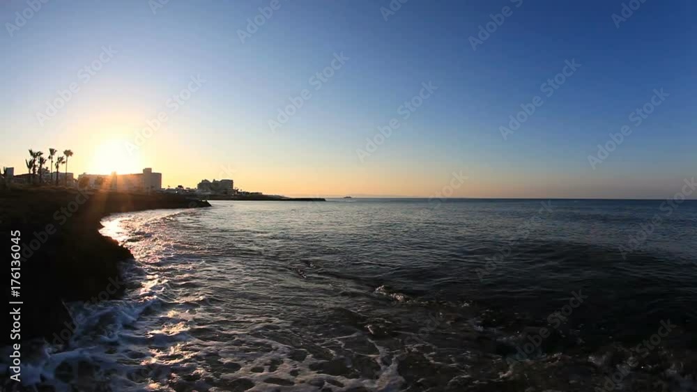 Sunset and sea waves in the Mediterranean Sea Sunset and sea waves in the Mediterranean Sea