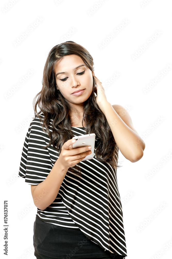 Indian young girl with smartphone Indian young girl with smartphone