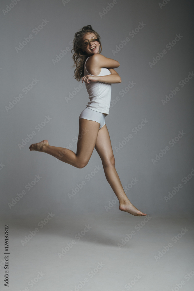 Model test of girl jumping in the studio Model test of girl jumping in the studio