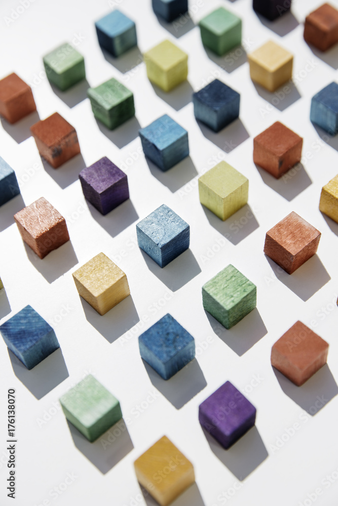 Colored cubes arranged next to each other Colored cubes arranged next to each other