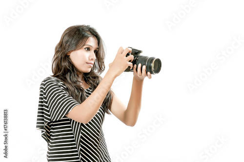 indian girl with camera © Niks Ads