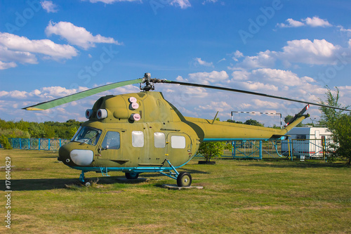 Military helicopter at field