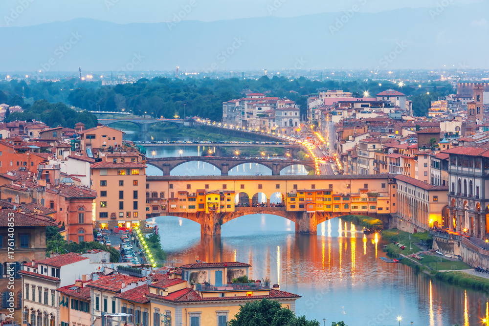River Arno and famous bridge Ponte Vecchio at twilight from Piazzale Michelangelo in Florence, Tuscany, Italy