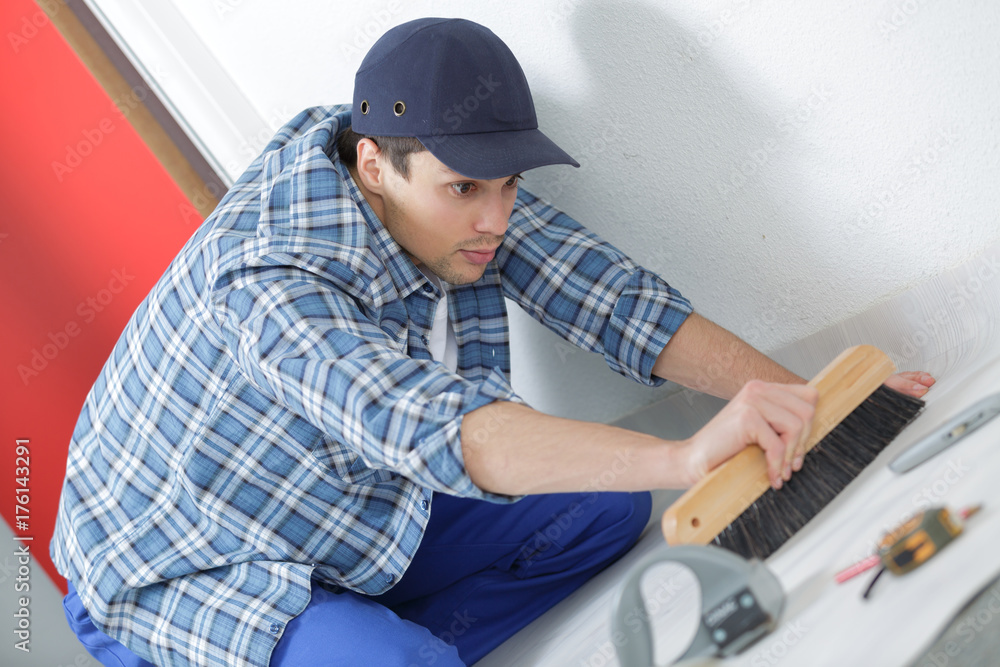 floor tiles installation man installs ceramic tile floor tiles installation man installs ceramic tile