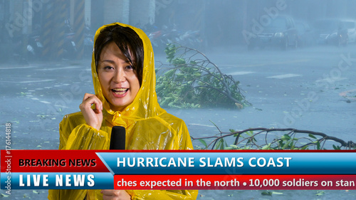 Weather reporter reporting on storm