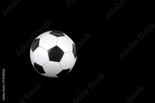 Soccer ball isolated on black background