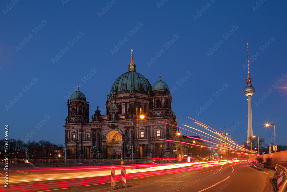 BERLIN, GERMANY - FEBRUARY 22, 2017: Night city traffic over Berlin Cathedral (Berliner dome). Long exposure shot.
