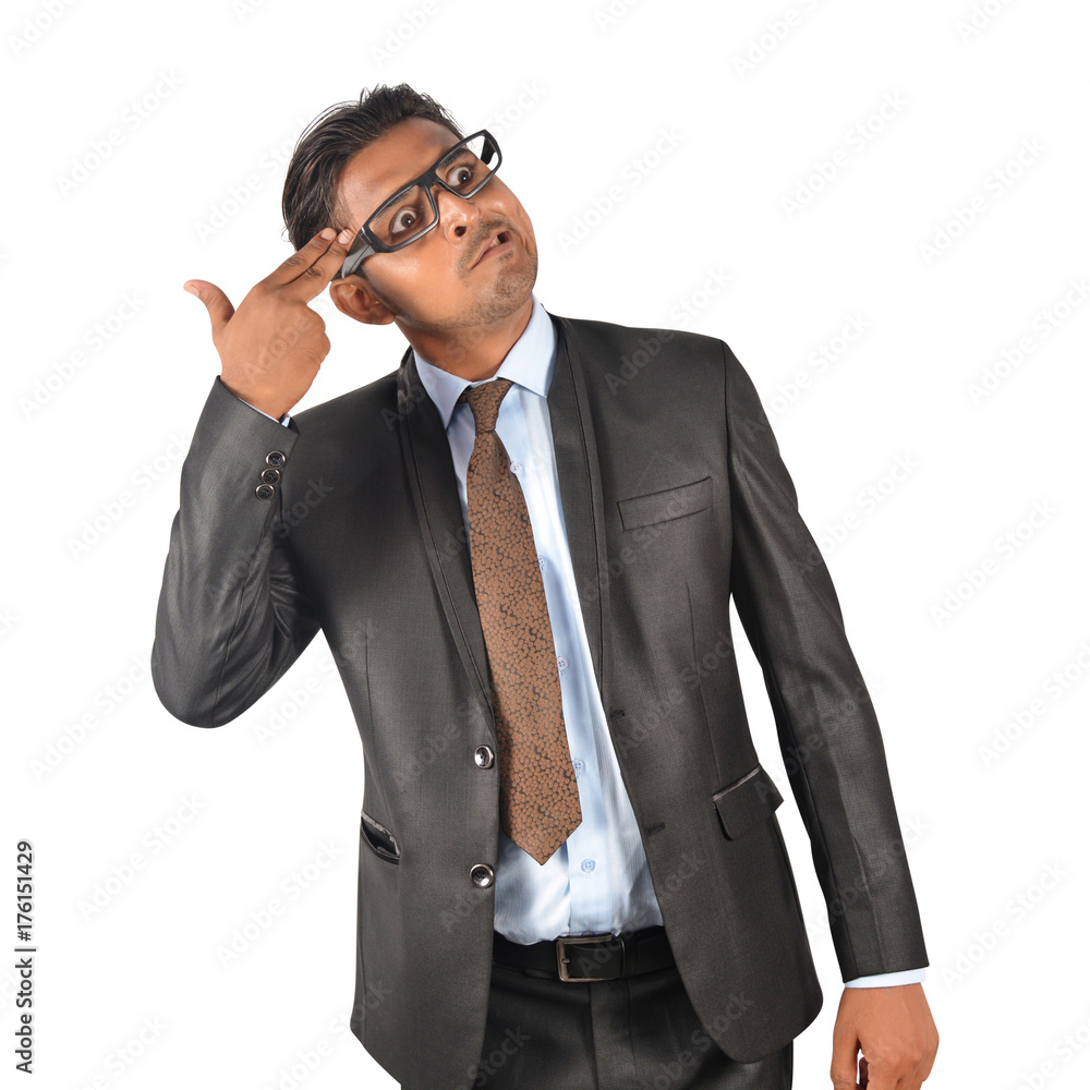 Young businessman in black suit suicide gesturing pose over white background Young businessman in black suit suicide gesturing pose over white background