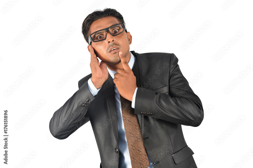 Confused businessman in black suit looking over white background Confused businessman in black suit looking over white background