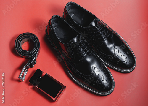 Male accessories. Shoes with perfume and belt