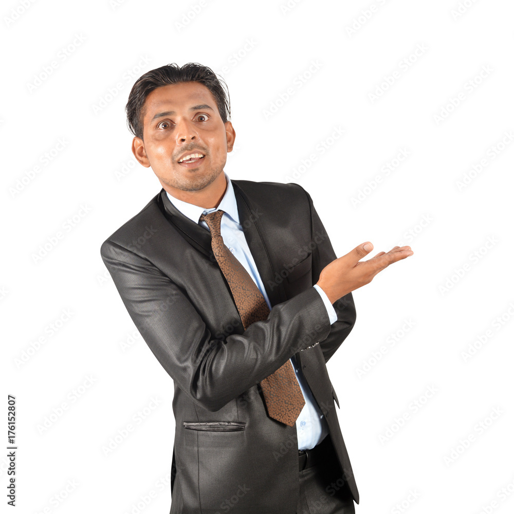 Businessman in black suit happily presenting over white background Businessman in black suit happily presenting over white background