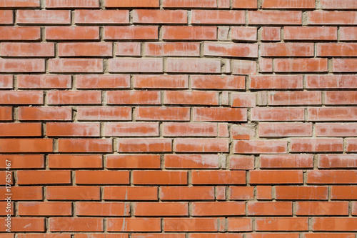 Brick wall close-up. New red brick wall background