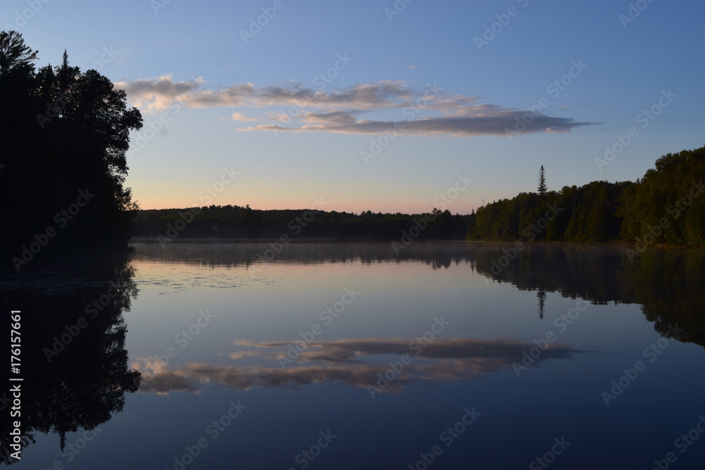 Lakeside at dusk with sky reflected 2