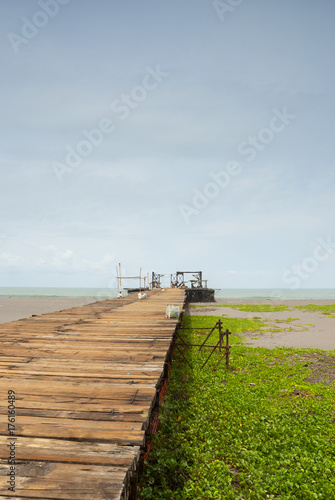 Old rusty pier in Guatemala shot in a cloudy morning. Champerico © Byron Ortiz