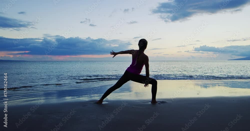 Woman Practicing Yoga at Sunset Woman Practicing Yoga at Sunset