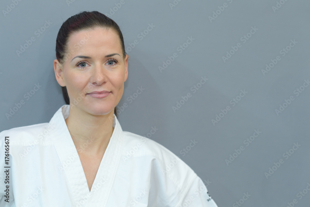 portrait of female fighter on grey background portrait of female fighter on grey background