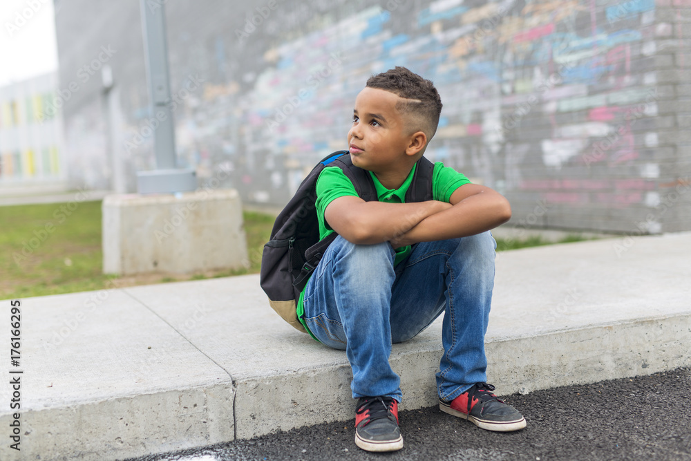cheerful african american primary school boy with backpack cheerful african american primary school boy with backpack