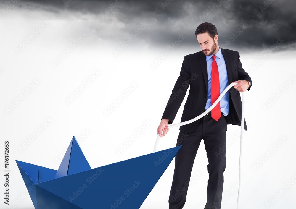 Obraz premium Businessman with paper boat in sky clouds pulling rope