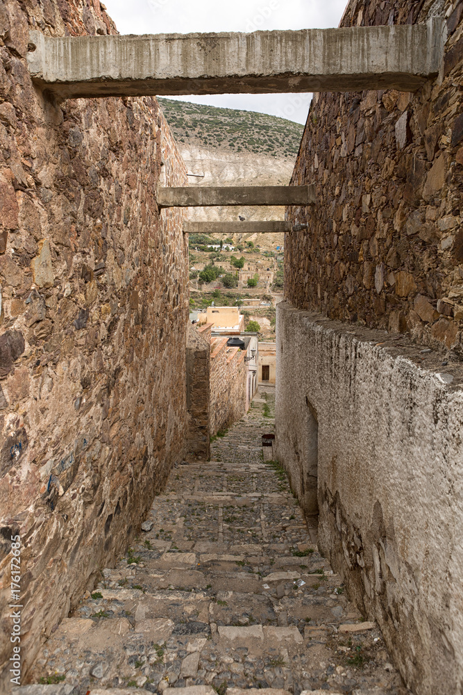 May 22, 2014 Real de Catorce, Mexico: narrow cobblestone streets and mostly abandoned stone buildings all through the town once known for silver mining
