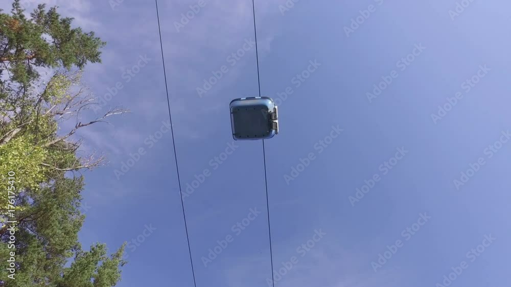 Cable car gondola transportation against blue sky