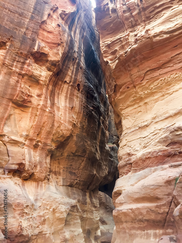 Al Siq passage to ancient Petra town. Rock-cut town Petra was established about 312 BC as the capital city of the Arab Nabataean photo