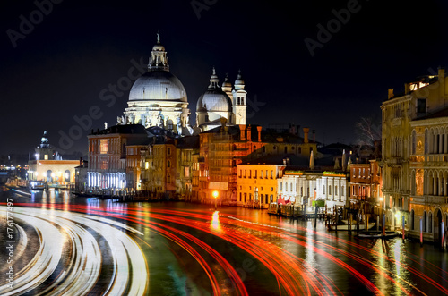Grand Canal and Basilica Santa Maria della Salute at night with light trails, Venice, Italy