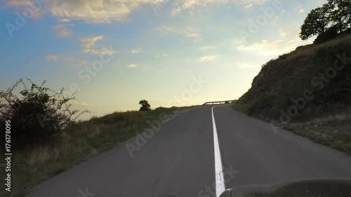 Unidentified driver on a vintage racing car racing Uphill. Drive  photo