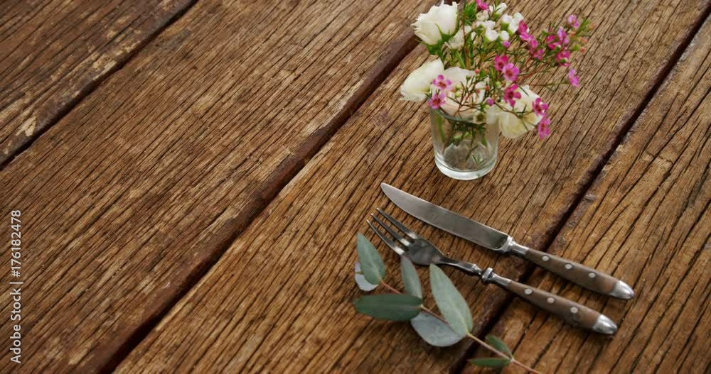 Various cutlery on wooden table Various cutlery on wooden table
