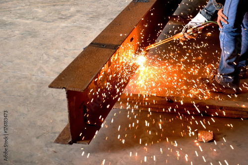 Welding sparks of beam steel from Welding technician or Sparks cut steel with fire gas.