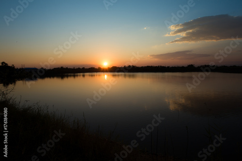 sunset on the lake. © Saravut