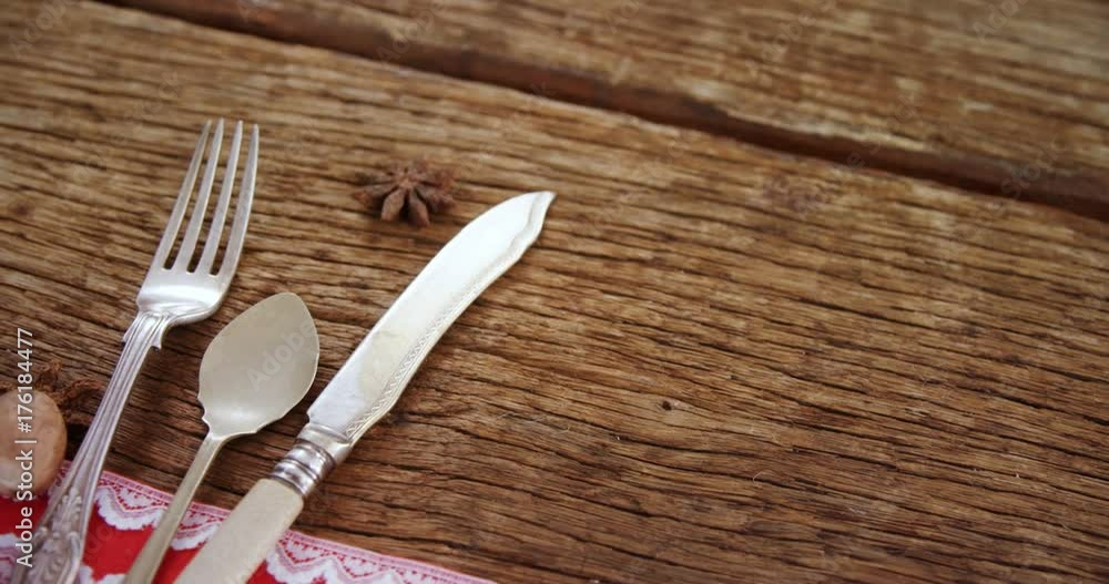 Various cutlery on wooden table Various cutlery on wooden table