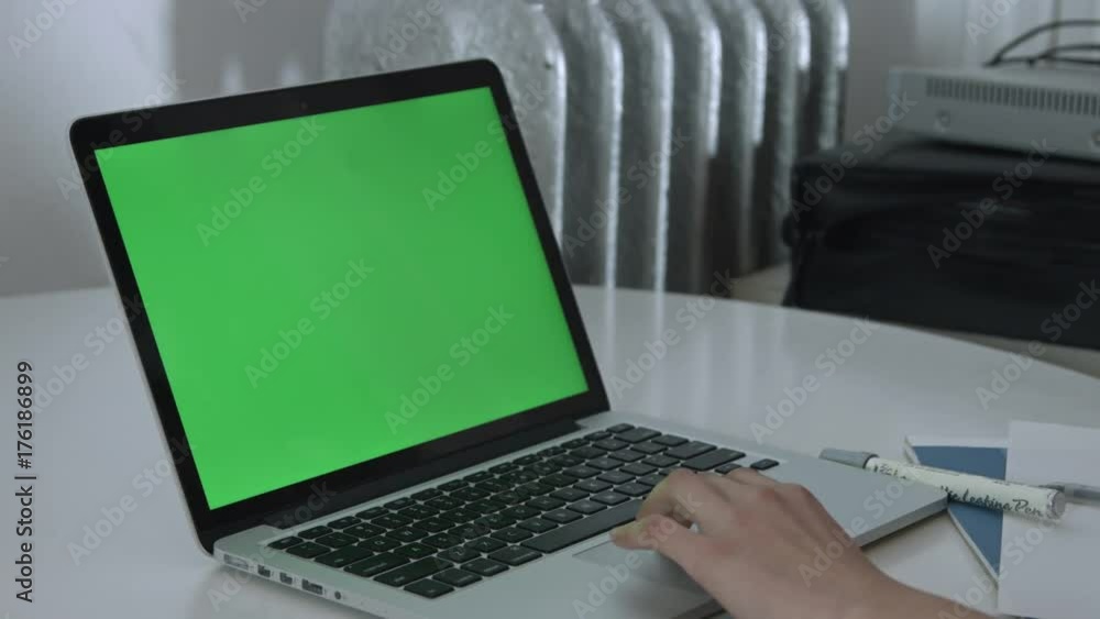 Laptop with a green screen Laptop with a green screen