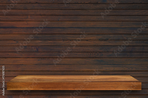 Empty top of wooden shelves on dark Board wood  background  For product display