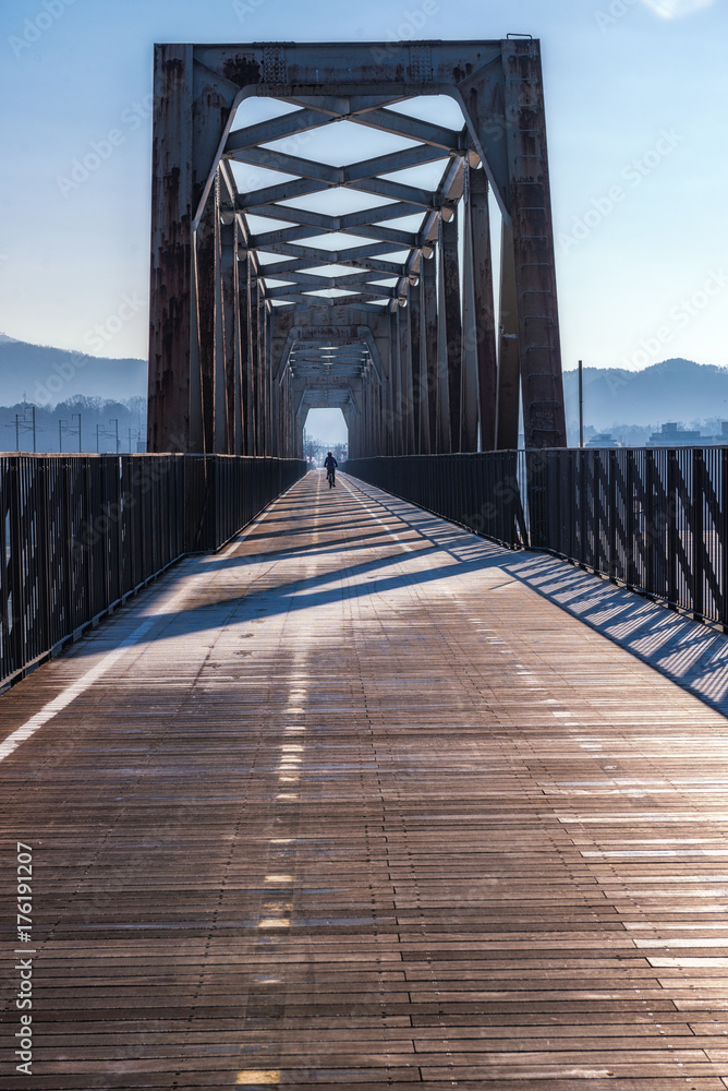 Obraz premium Young women exercise bike morning Silhouette