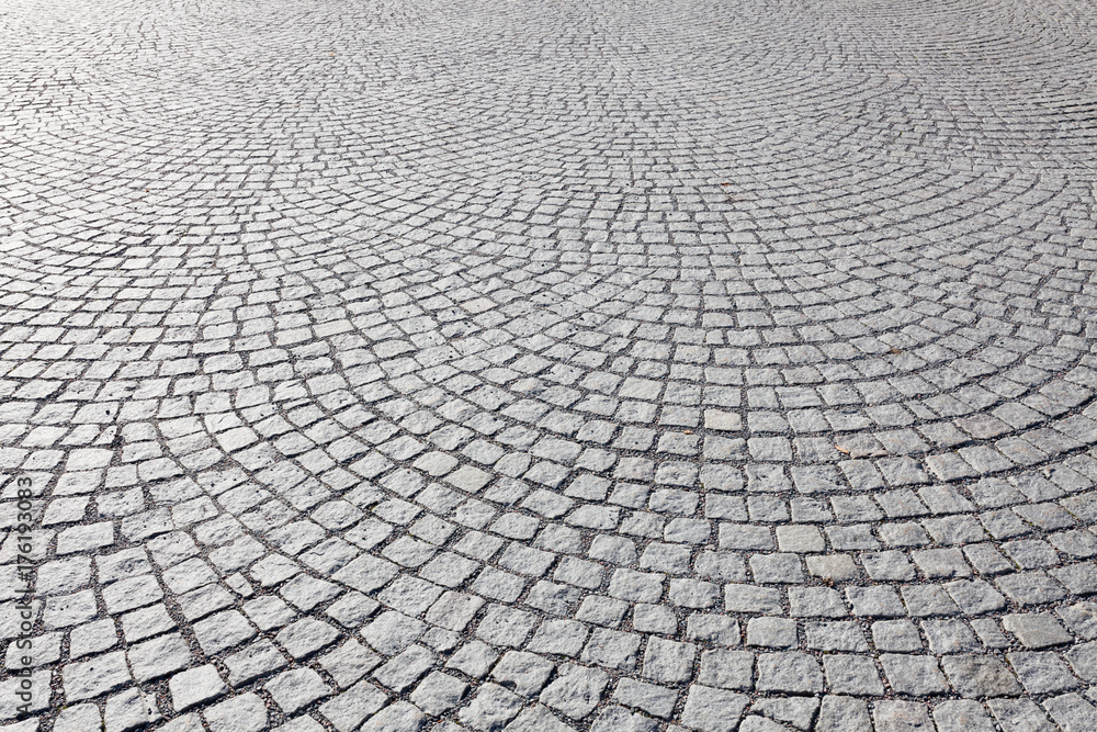 Old square cobble stone paving perspective background